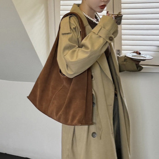 Autumn and winter new sanded leather triangle Tote bag large capacity commuter shoulder bag leisure all- leather women's bag